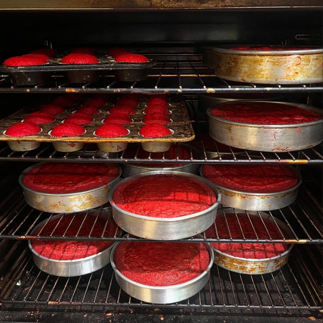 Red velvet cakes and cupcakes fresh from the oven